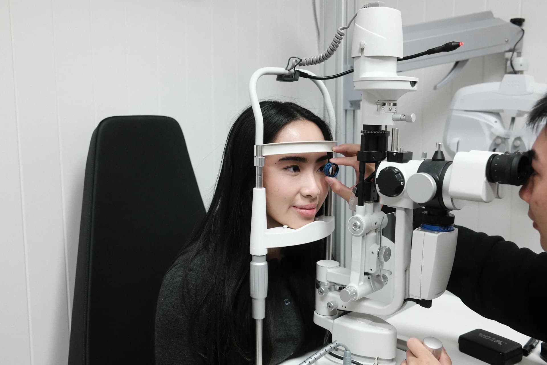 Optometrist performing a comprehensive eye examination